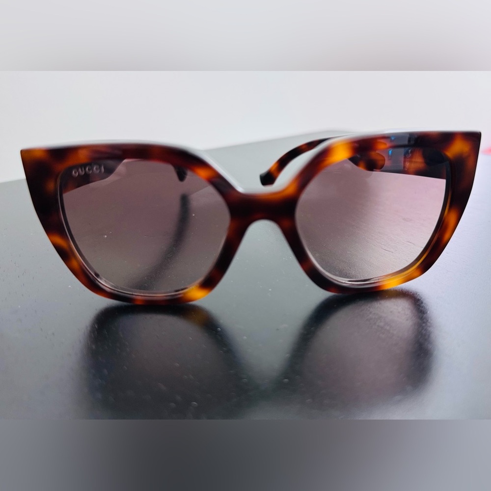 Gucci GG1300S tortoiseshell square-frame sunglasses.